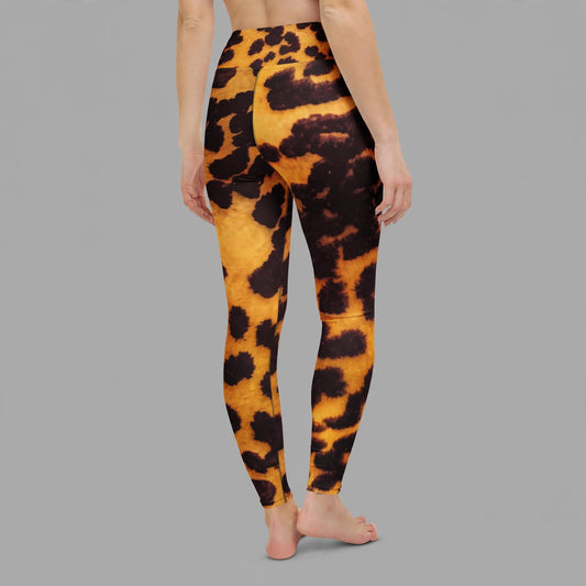 Leggings in the Tiger Orchid (gold and burgundy) print, studio product shot (view 2).