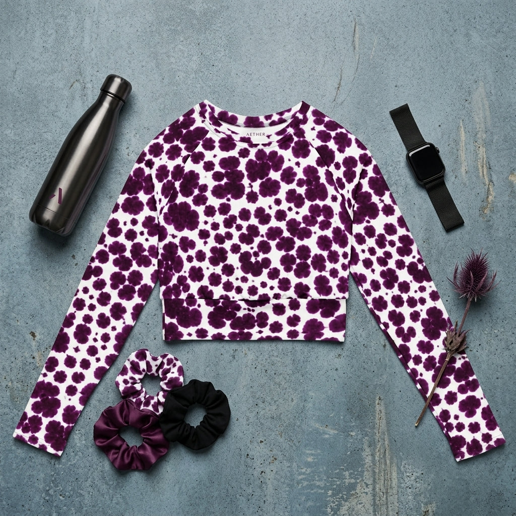 Long-sleeve crop top in the Lioulin Wild Cat Orchid (burgundy and cream) print, flat lay.