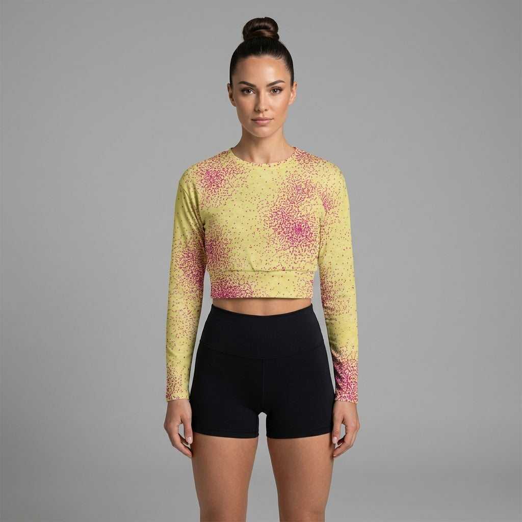 Fitness model wearing Dust Bunny Orchid (deep burgundy) long-sleeve crop top (view 2).