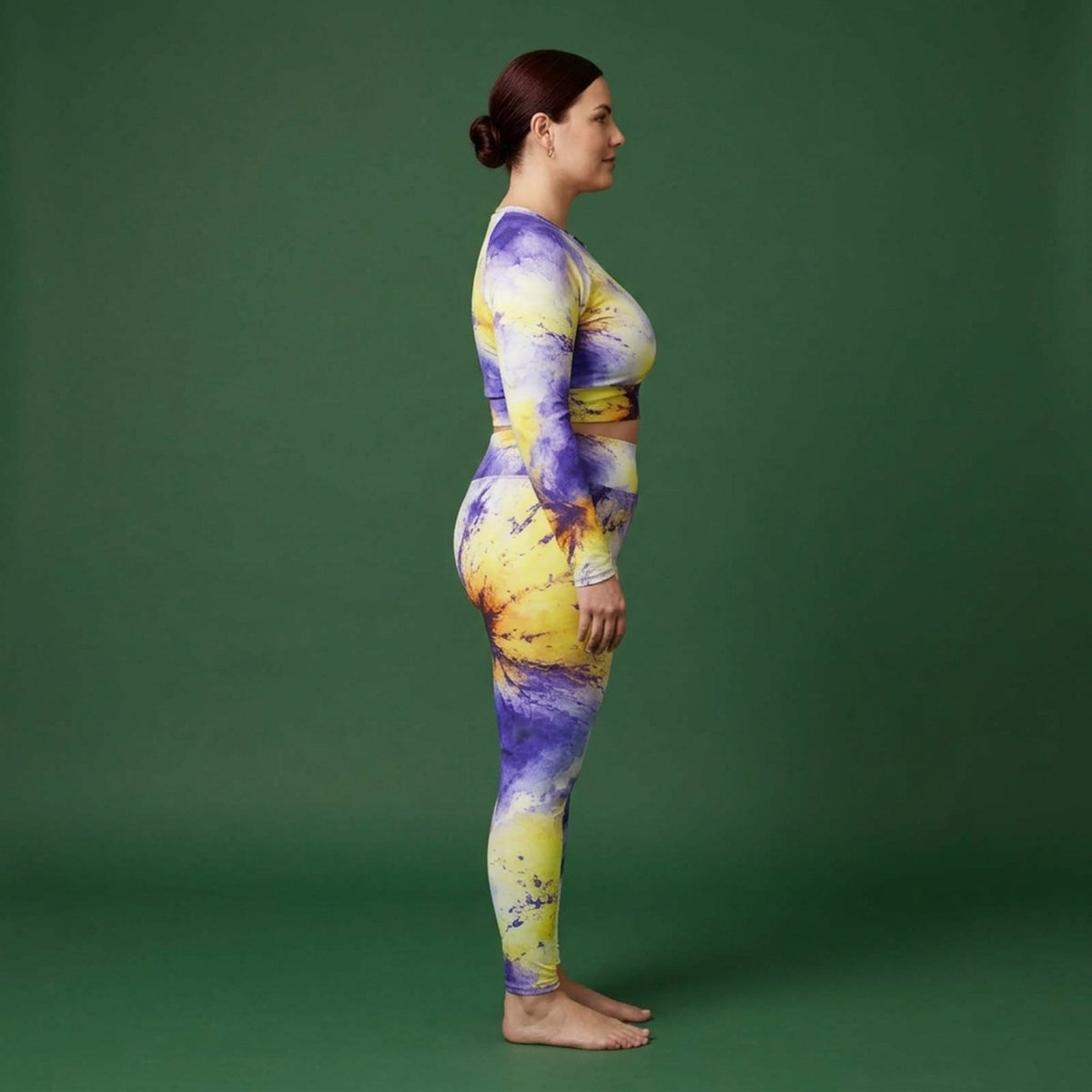Model wearing the Penny Purple Picotee Viola set – yoga leggings and long sleeve crop top