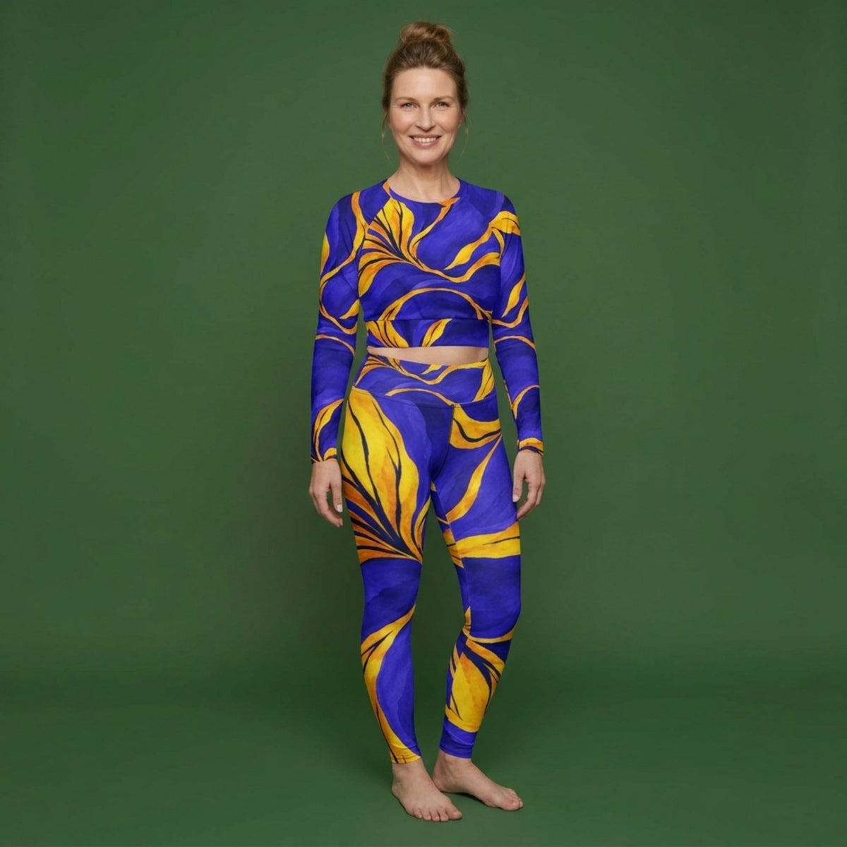 Model wearing the Sorbet Morpho Viola set – yoga leggings and long sleeve crop top