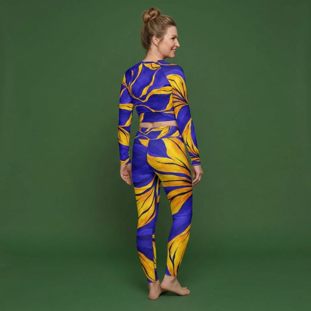 Model wearing the Sorbet Morpho Viola set – yoga leggings and long sleeve crop top