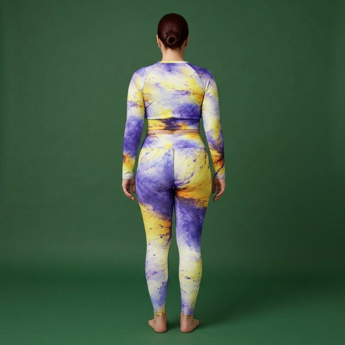 Model wearing the Penny Purple Picotee Viola set – yoga leggings and long sleeve crop top