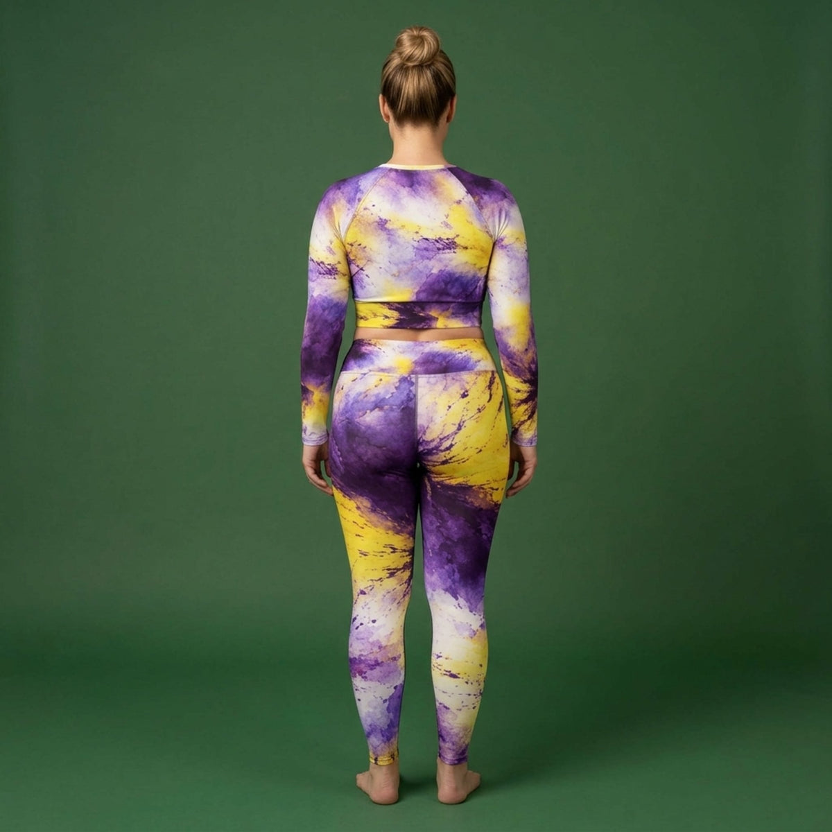 Model wearing the Sorbet Midnight Glow Viola set – yoga leggings and long sleeve crop top