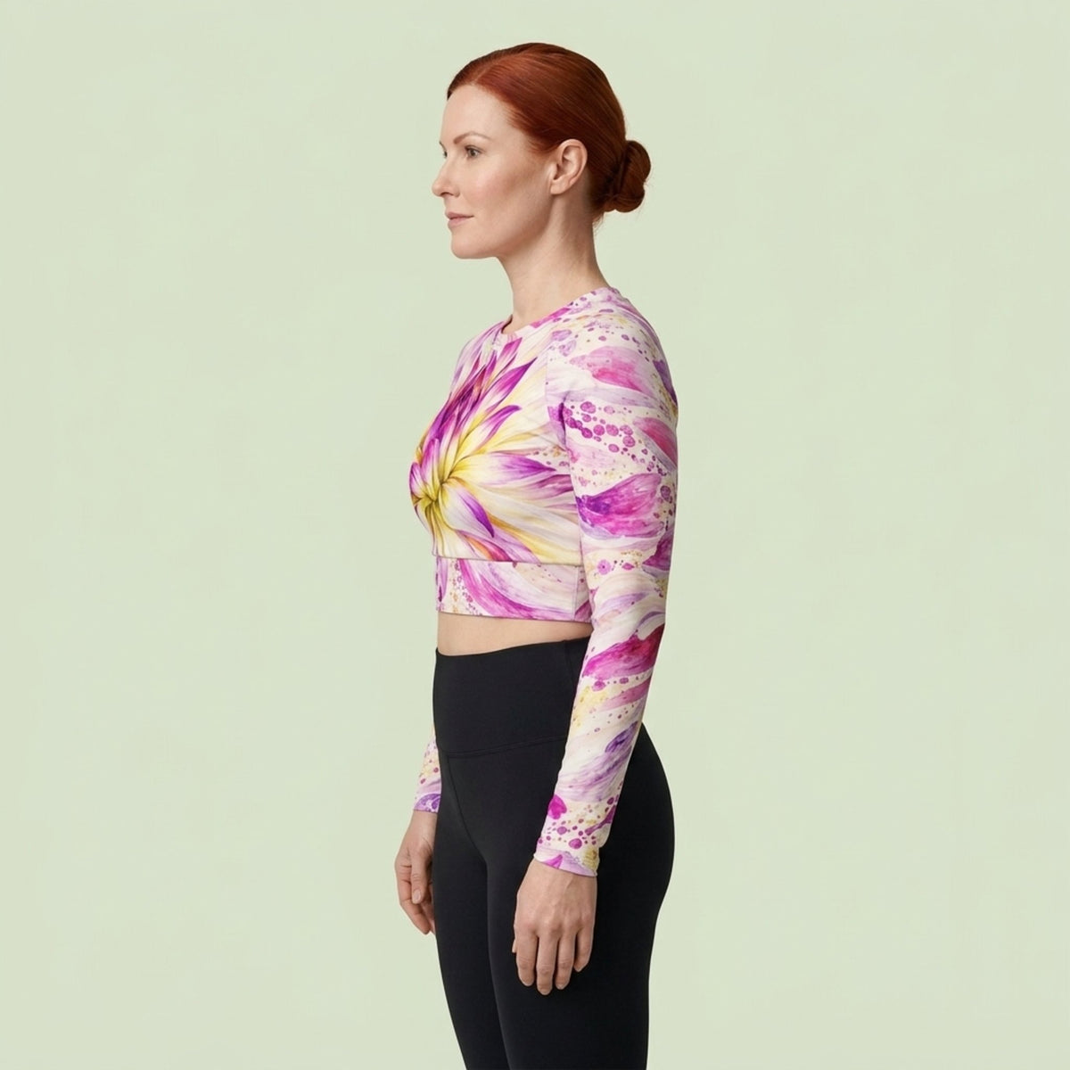 Model wearing the Bold Accent Dahlia Long Sleeve Crop Top in a studio