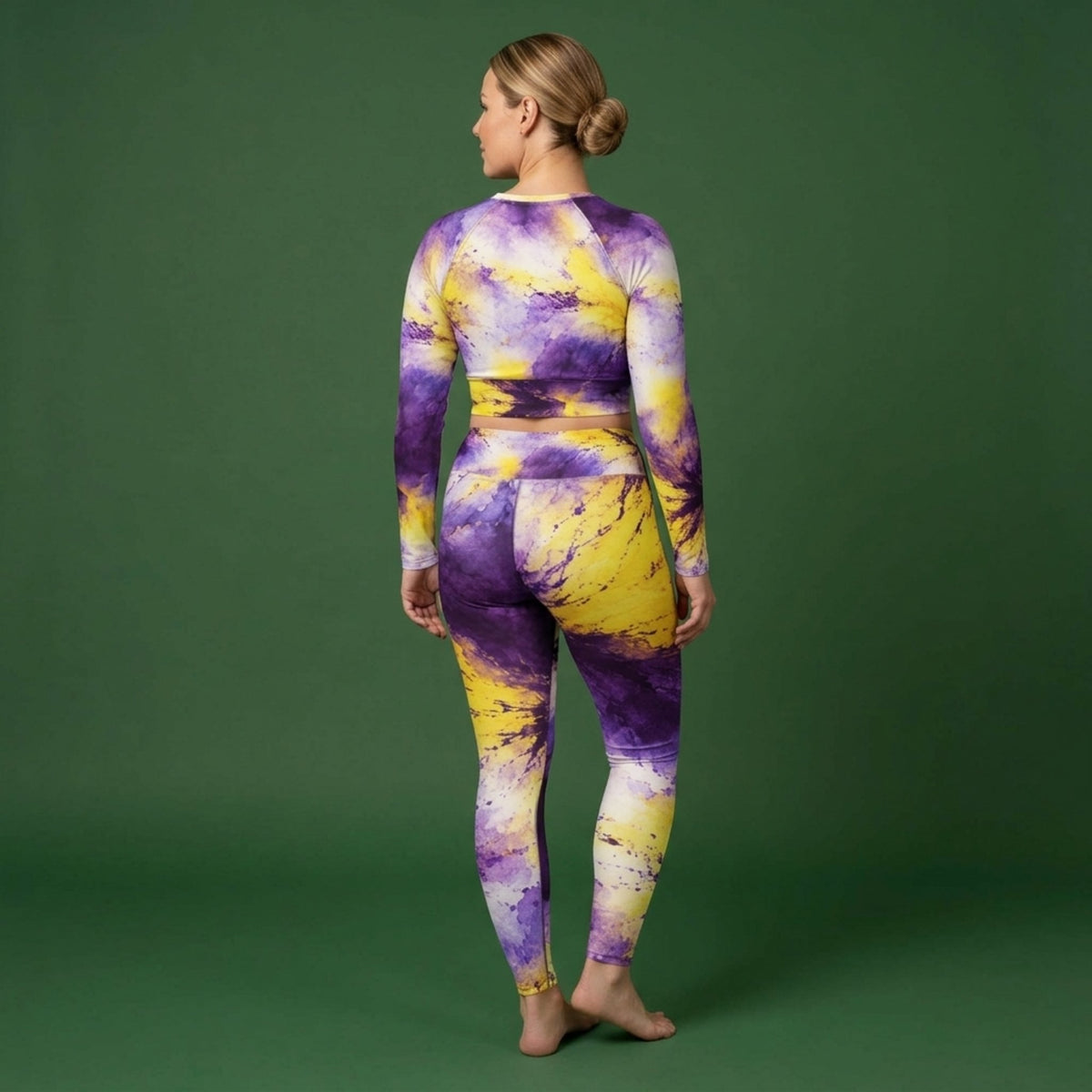 Model wearing the Sorbet Midnight Glow Viola set – yoga leggings and long sleeve crop top