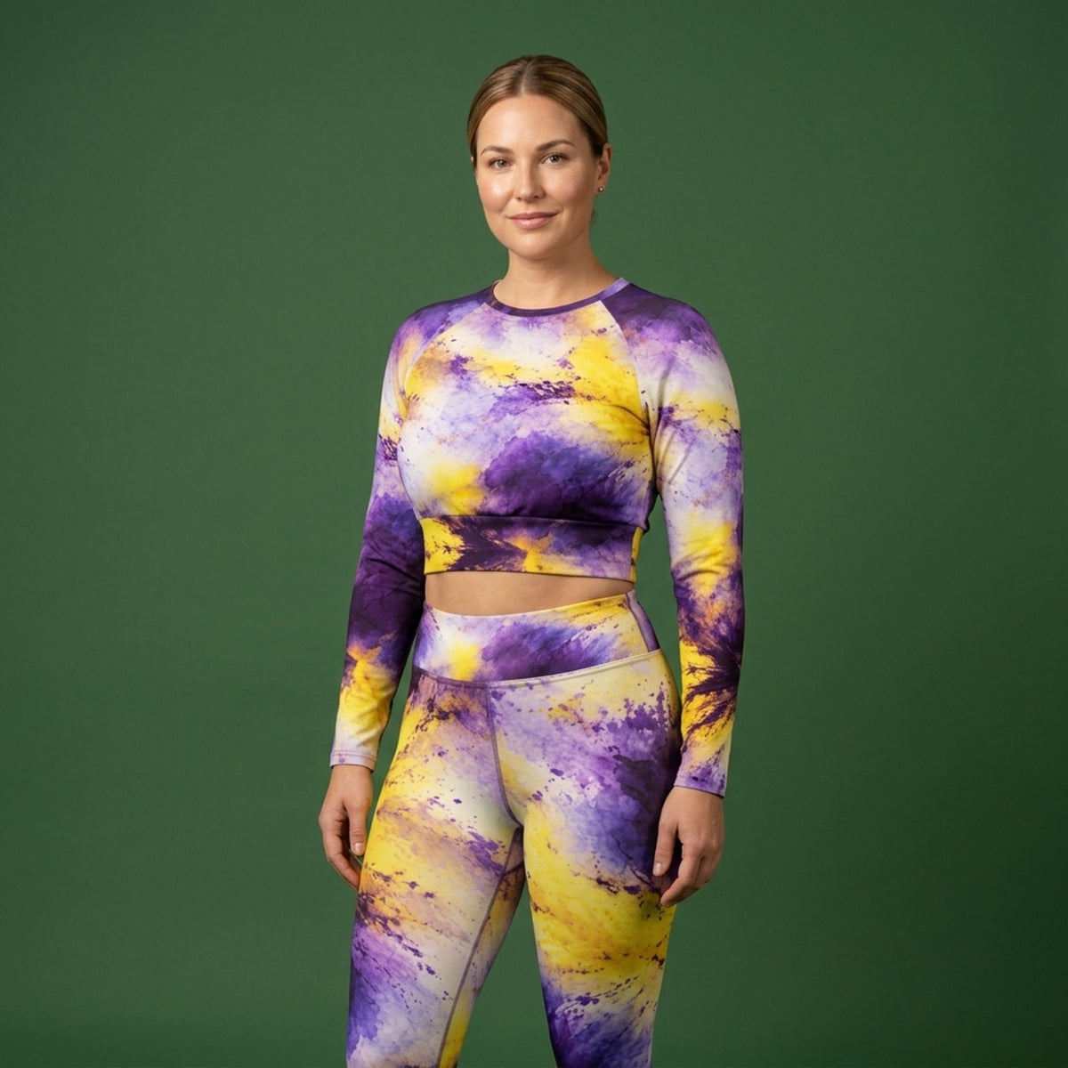 Model wearing the Sorbet Midnight Glow Viola set – yoga leggings and long sleeve crop top