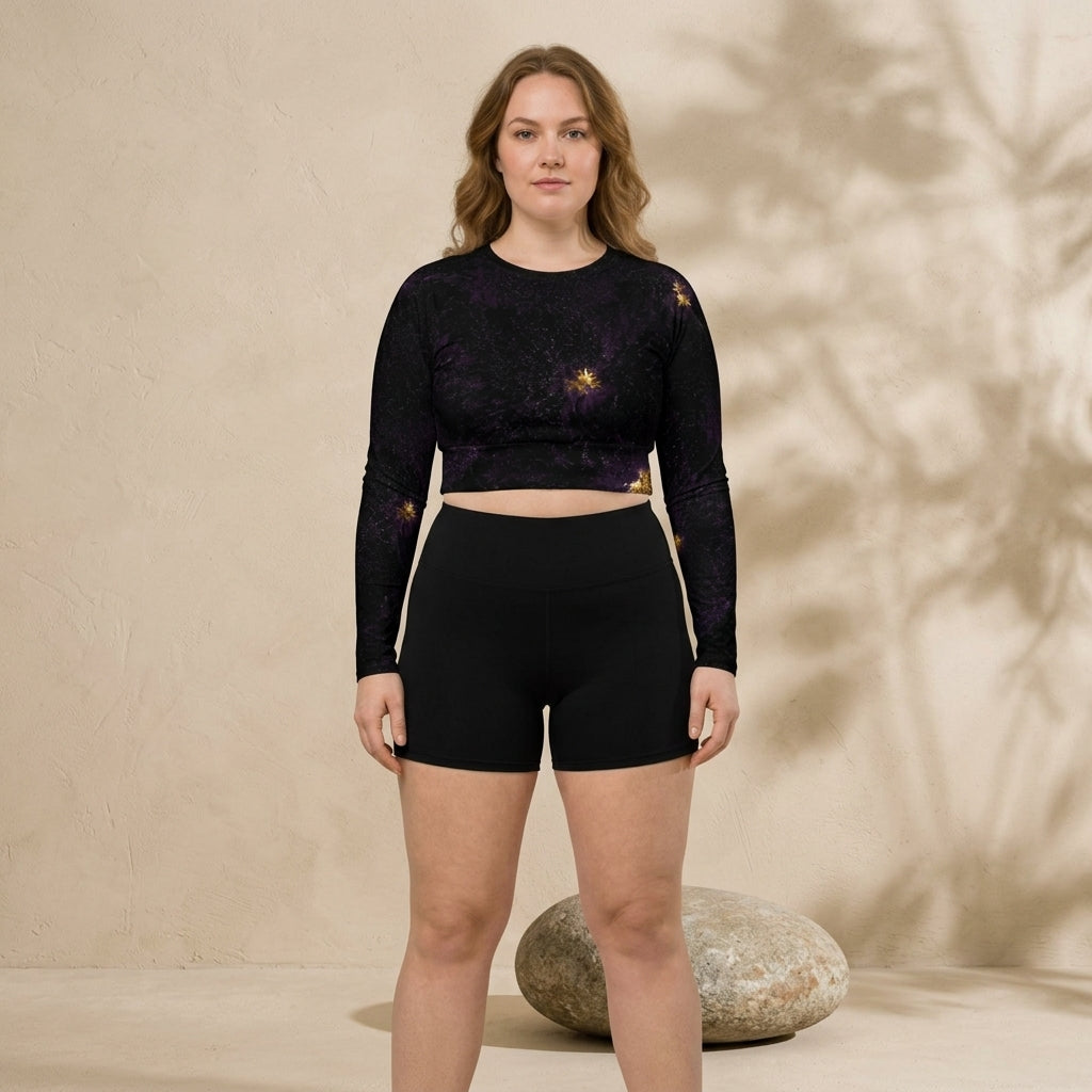 Model wearing black activewear crop top in studio