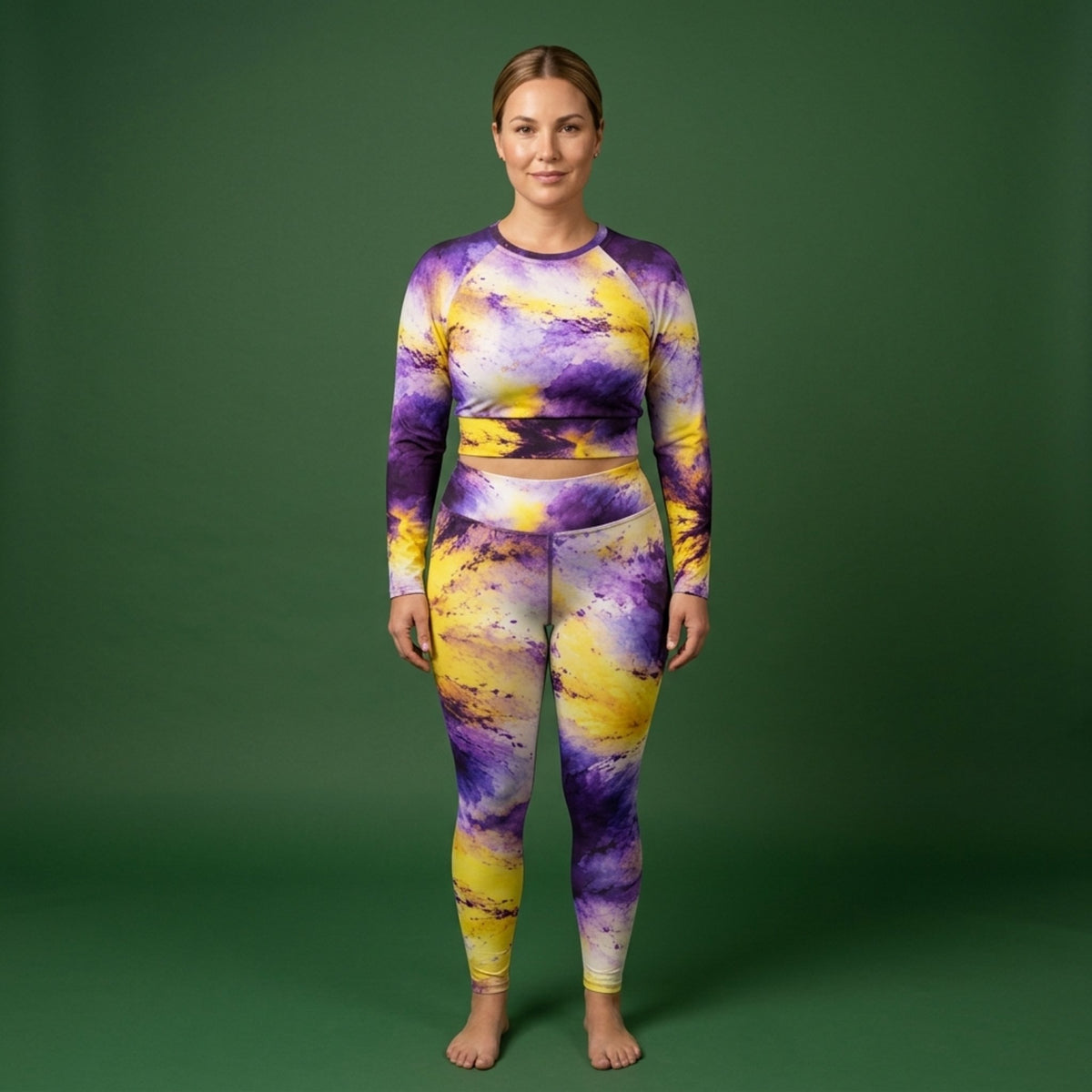 Model wearing the Sorbet Midnight Glow Viola set – yoga leggings and long sleeve crop top