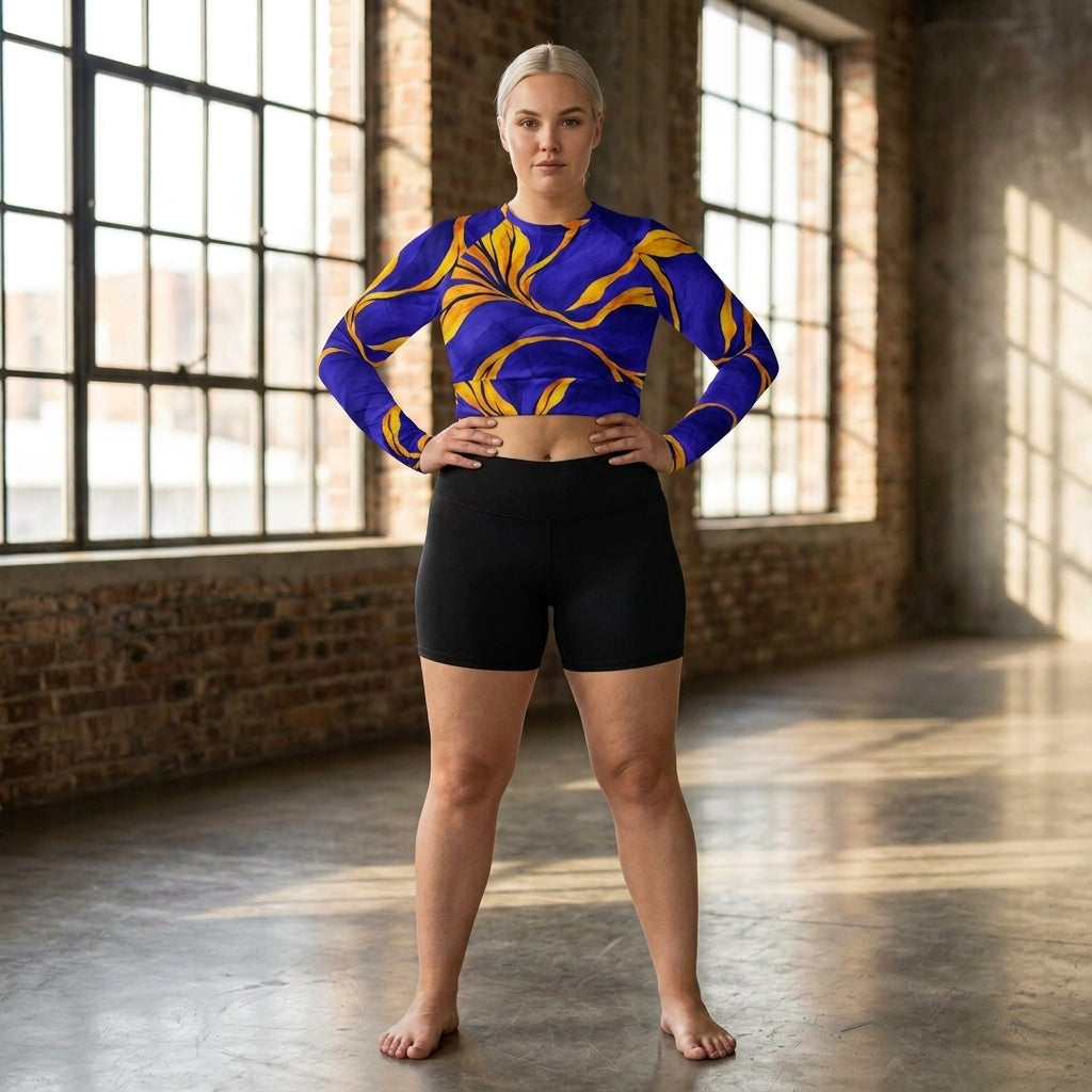 Model wearing blue and yellow activewear shorts and crop top
