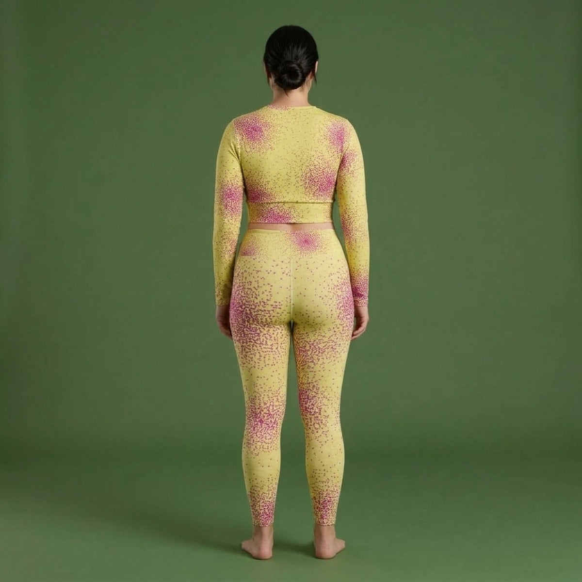 Model wearing the Dust Bunny Orchid set – yoga leggings and long sleeve crop top