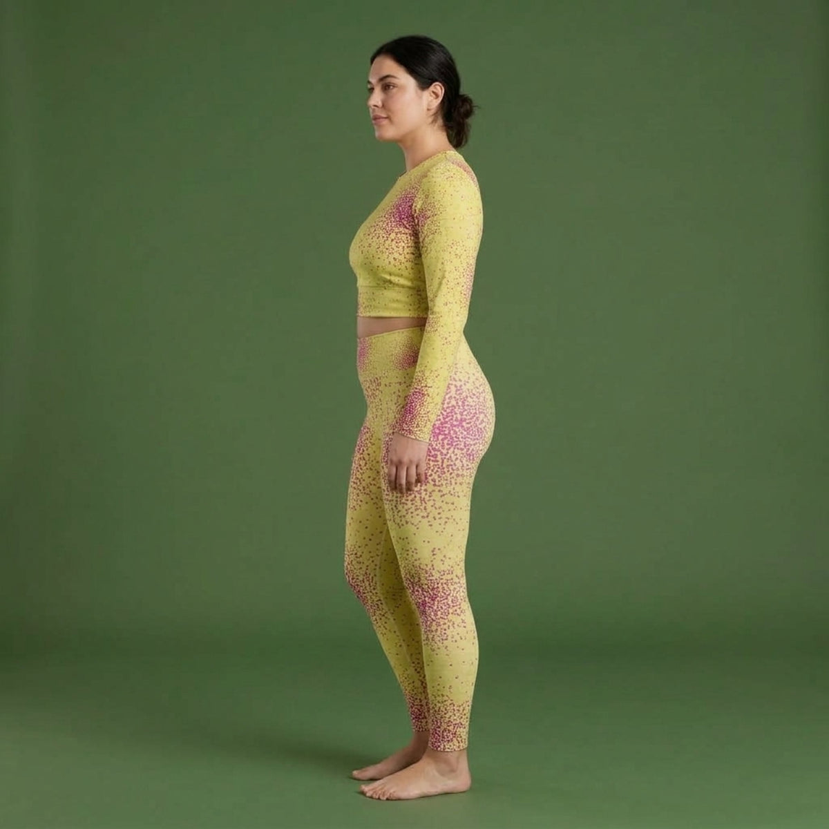 Model wearing the Dust Bunny Orchid set – yoga leggings and long sleeve crop top