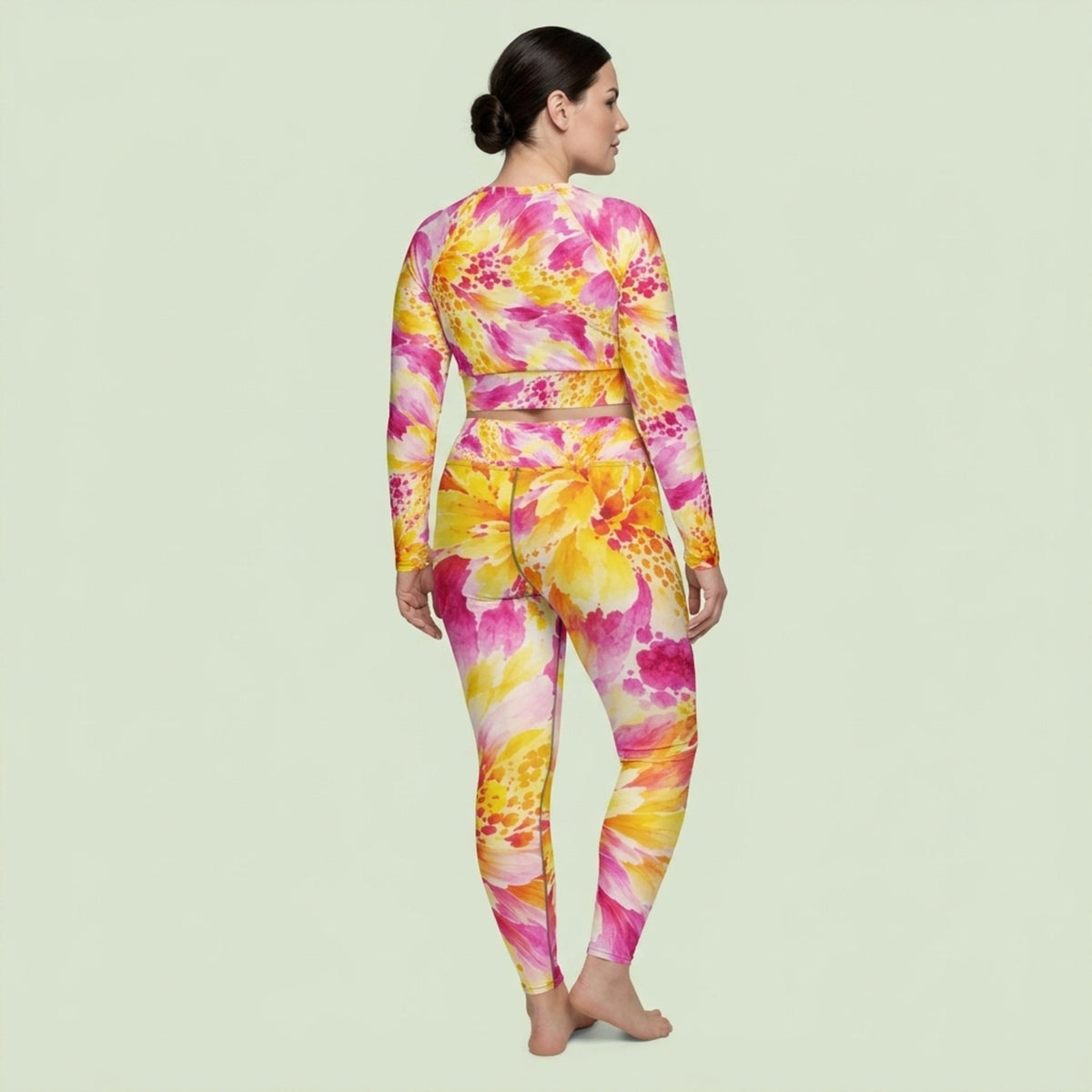 Plus-size model wearing Labyrinth Dahlia print long-sleeve crop top