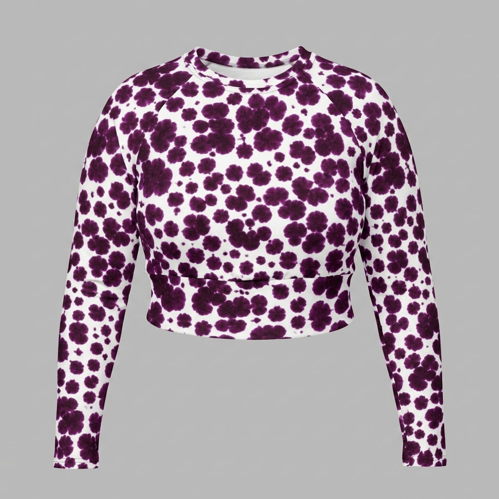 Long-sleeve crop top in the Lioulin Wild Cat Orchid (burgundy and cream) print, studio product shot.