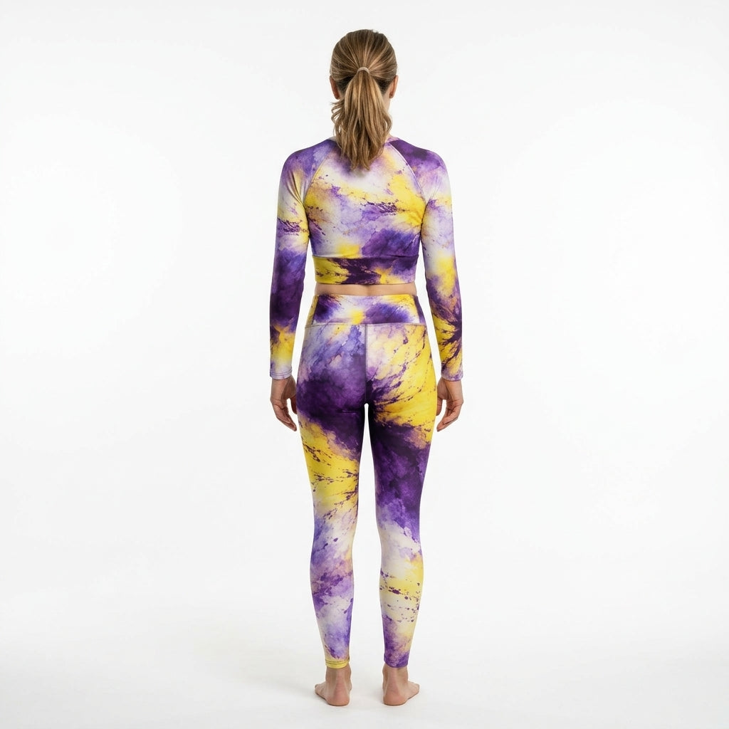 Model wearing a matching Sorbet Midnight Glow activewear set in an athletic pose.