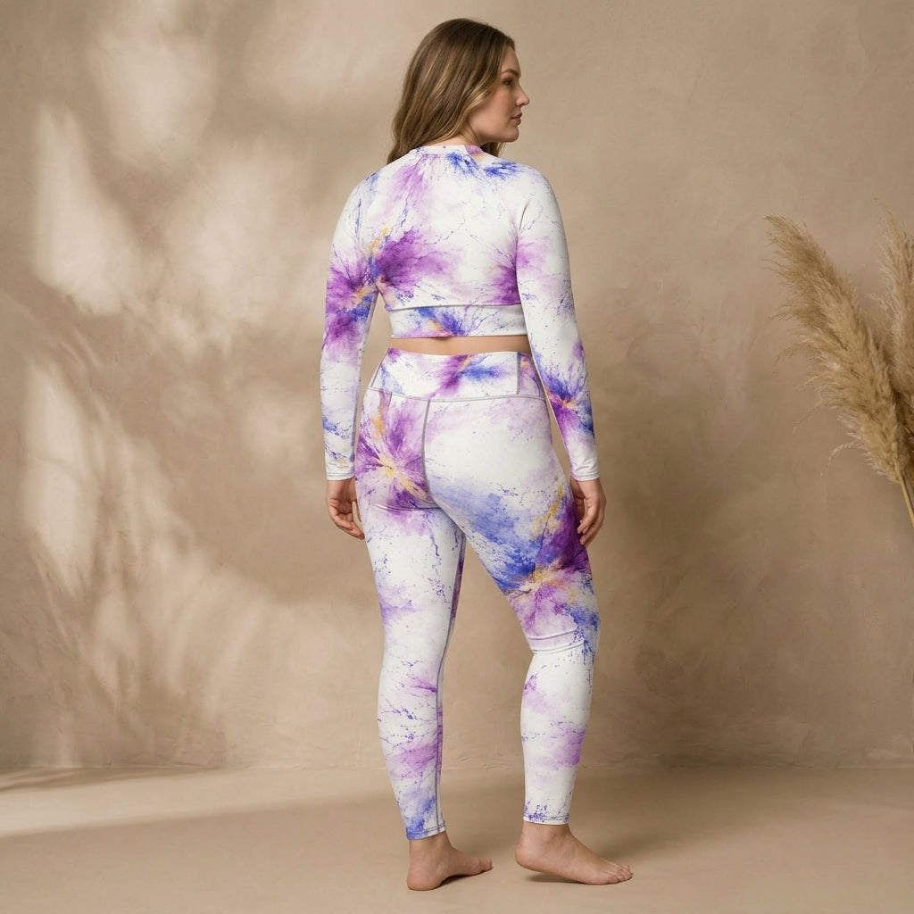 Model wearing a matching activewear set in the Sorbet Pink Halo print (view 2).
