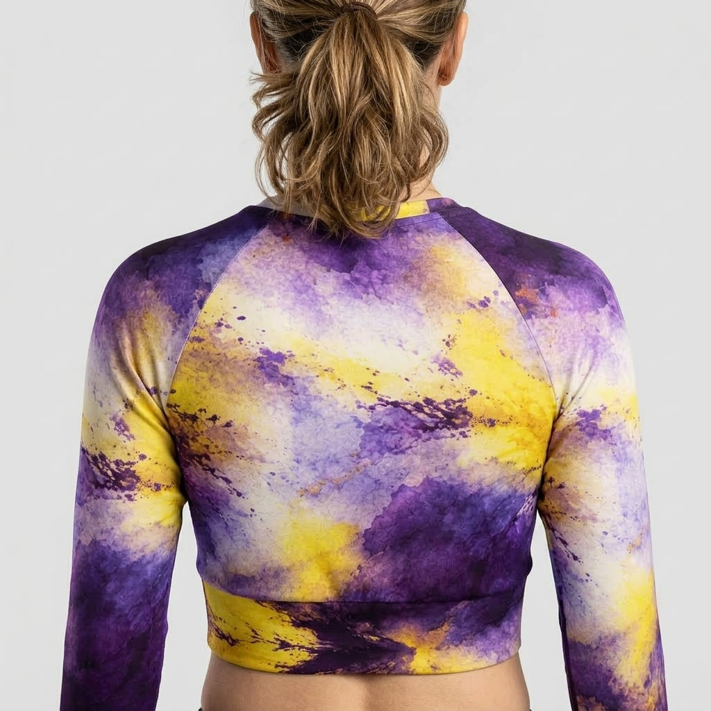 Model wearing a Sorbet Midnight Glow long-sleeve crop top.