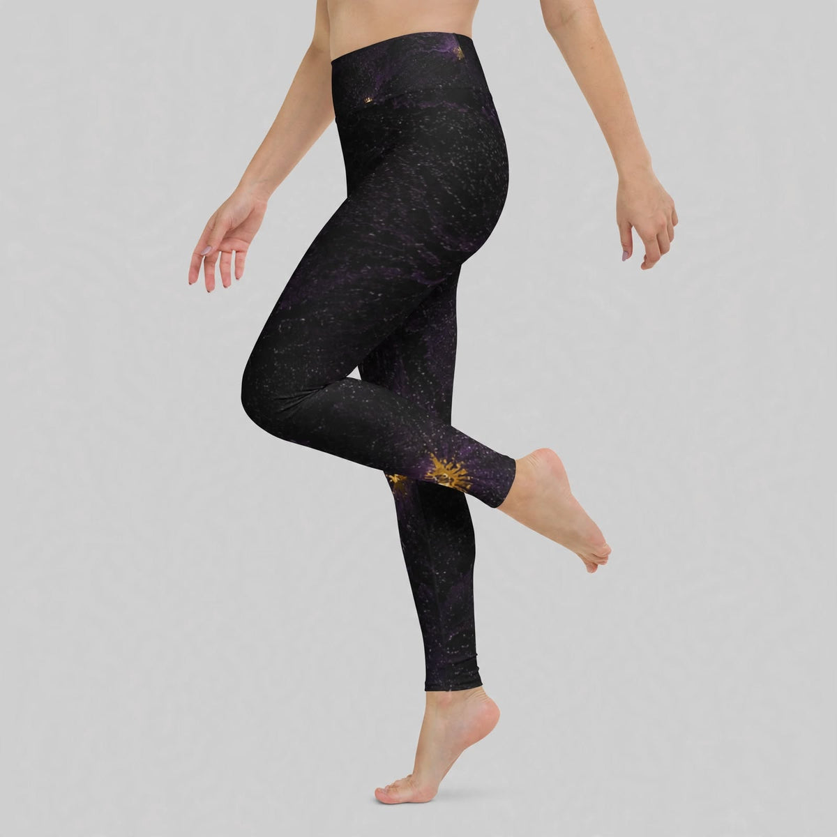 Black galaxy-print leggings on grey background