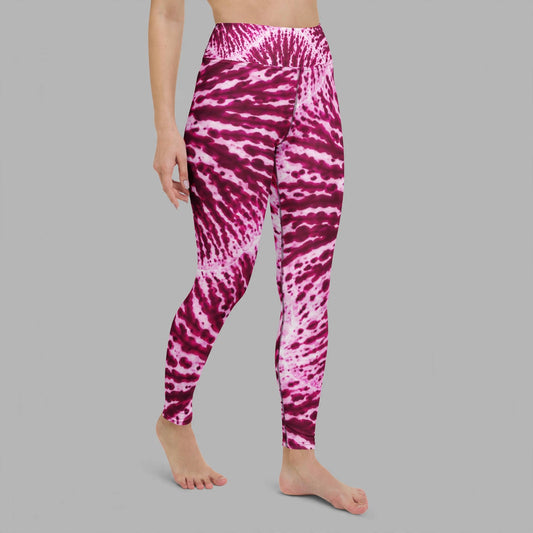Leggings in the Phalaenopsis Orchid (ivory and magenta) print, studio product shot.
