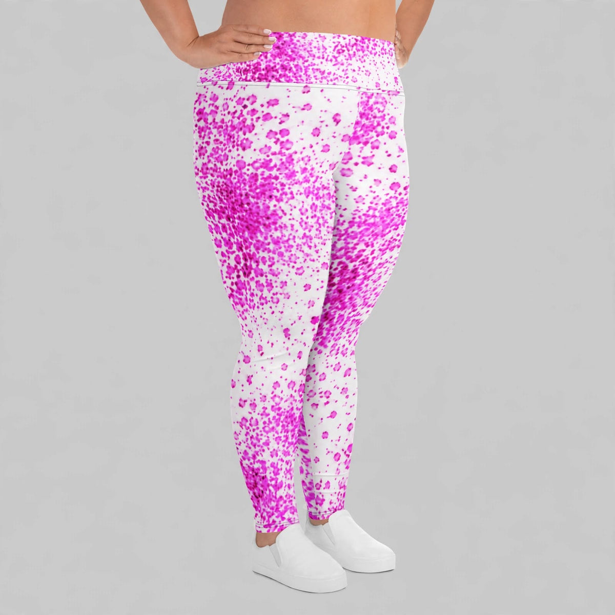Pink paint-splatter leggings, close-up view