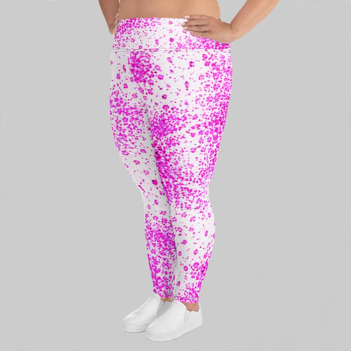 Pink paint-splatter high-waisted leggings, front view