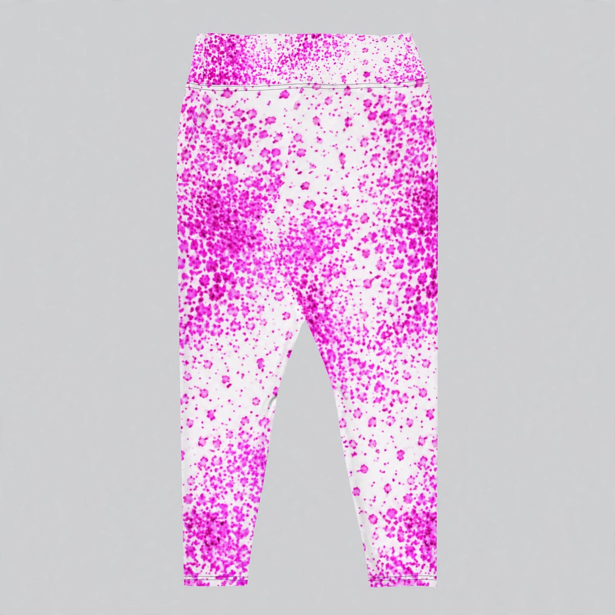 Pink paint-splatter leggings on light grey background