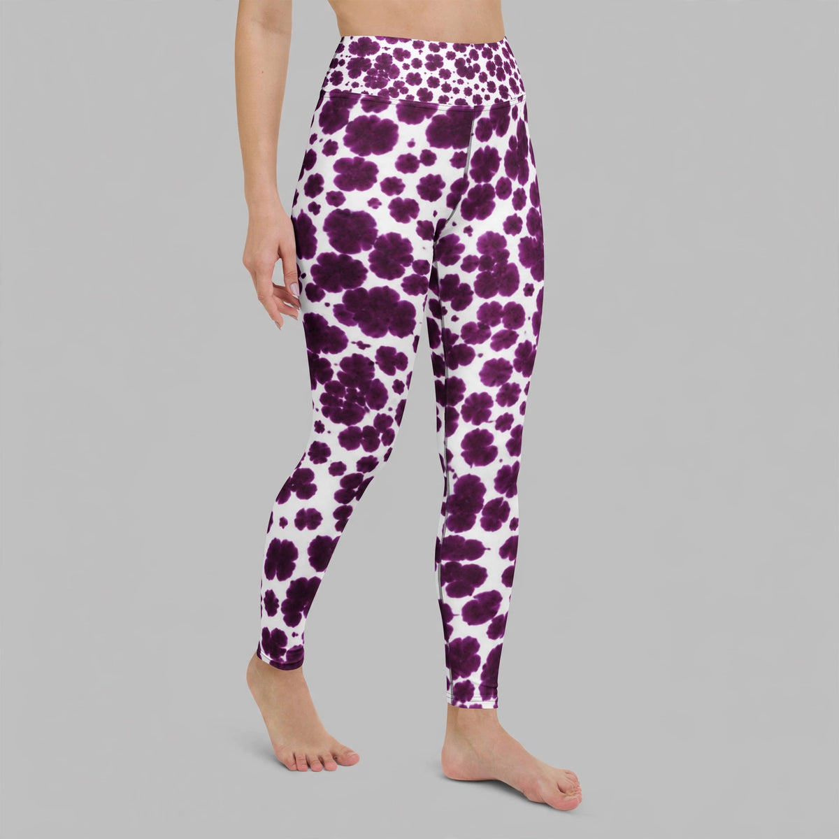 Leggings in the Lioulin Wild Cat Orchid (burgundy and cream) print, studio product shot.