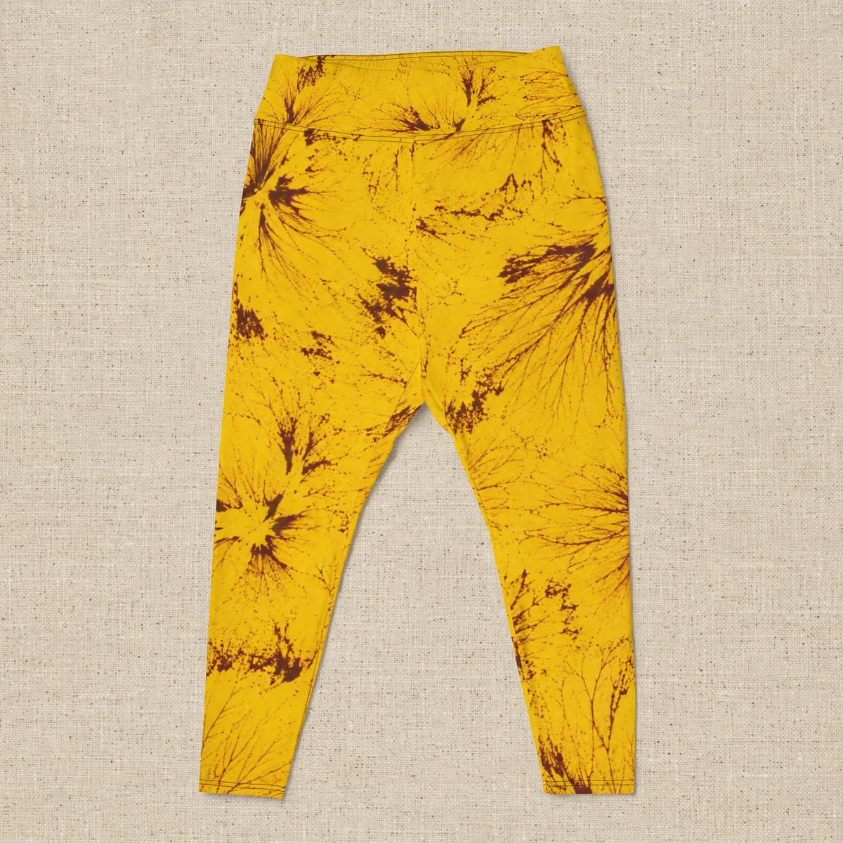Plus size leggings in the Sorbet Honeybee print, studio product shot with linen backdrop (view 2).