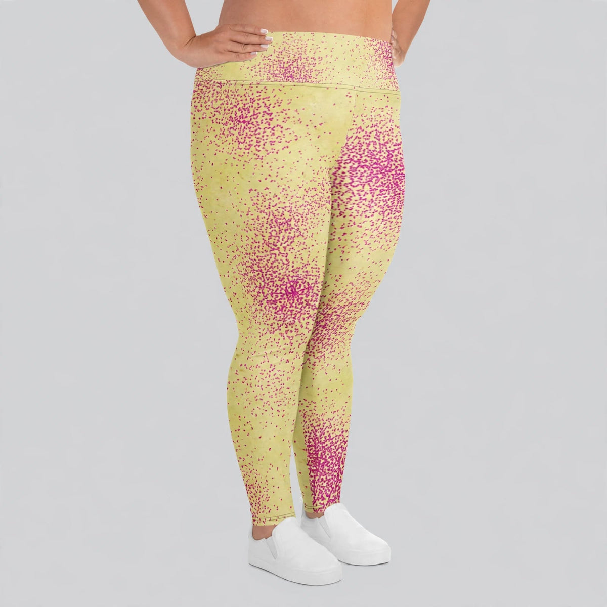 Bright yellow high-waisted leggings, studio front view